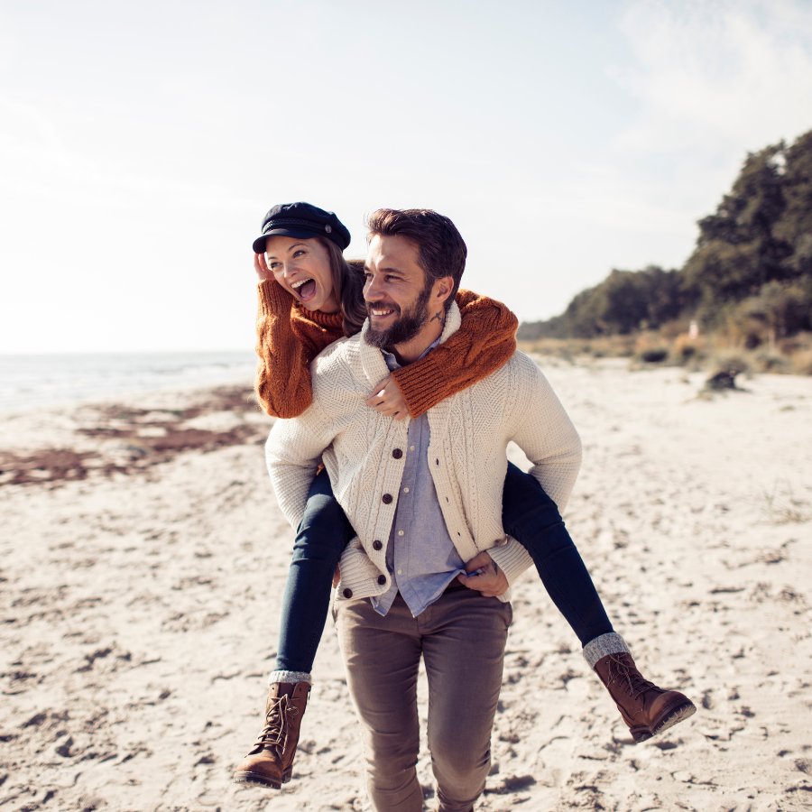 Erectile Dysfunction. Happy couple on the beach.